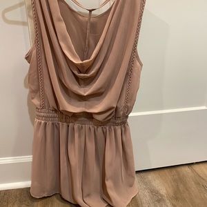 Boutique romper. Dusty pink. Open back.buttons on the top shoulder.